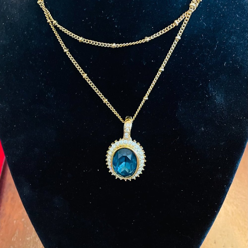 ROMAN SIGNED TOURMALINE CABOCHON IN A YELLOW 14K GOLD PENDANT SURROUNDED BY CZ's